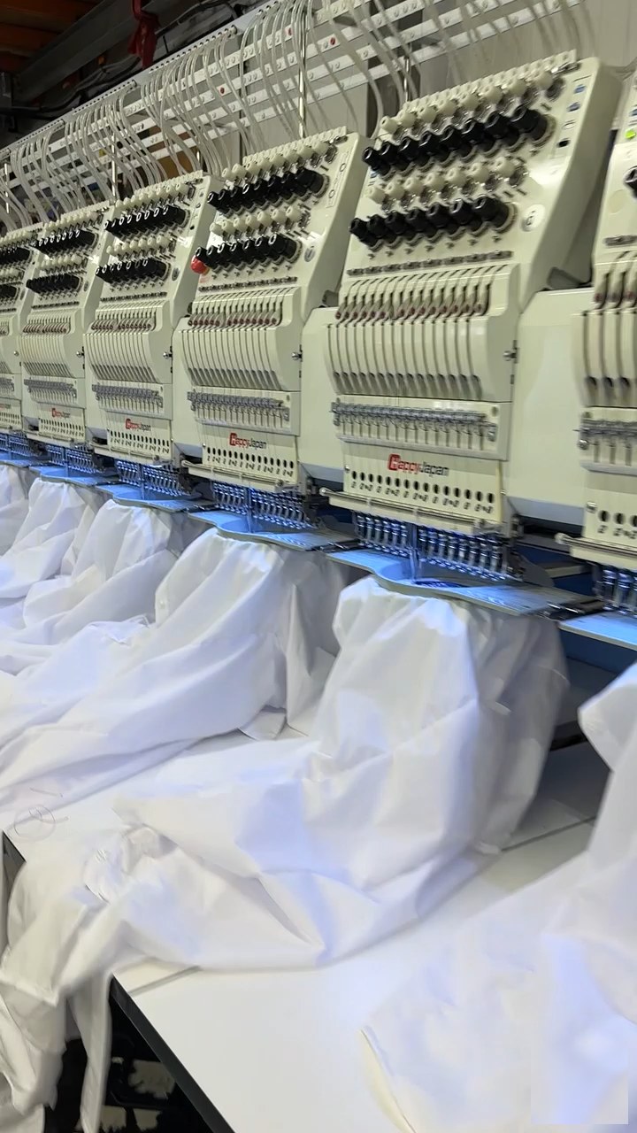 Classic Stitch machine floor — rows of HappyJapan embroidery heads